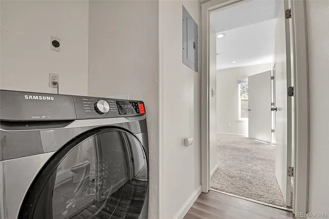 a view of livingroom with washer and dryer