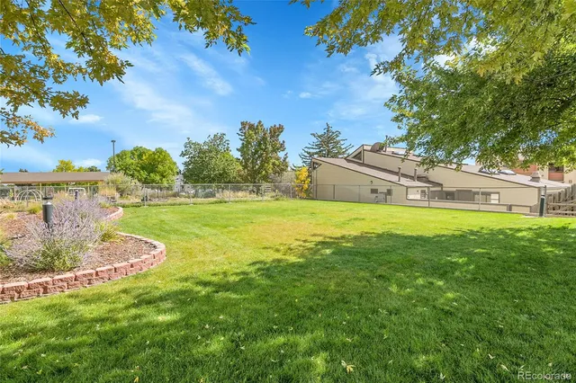 a view of a yard with an outdoor space