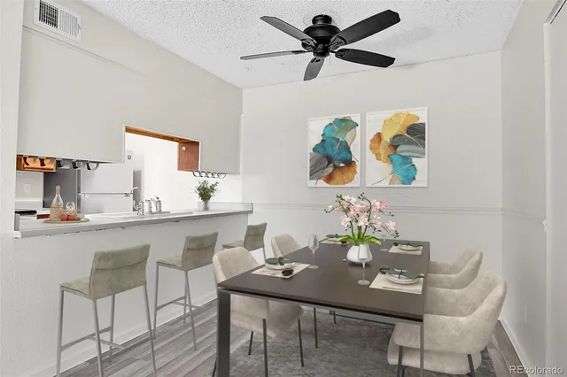 a view of a workspace with furniture