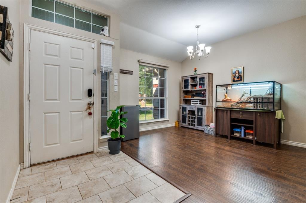 1211 Maple Terrace Drive Mansfield, TX 76063 - Photo 4 of 26 an empty room with furniture and wooden floor