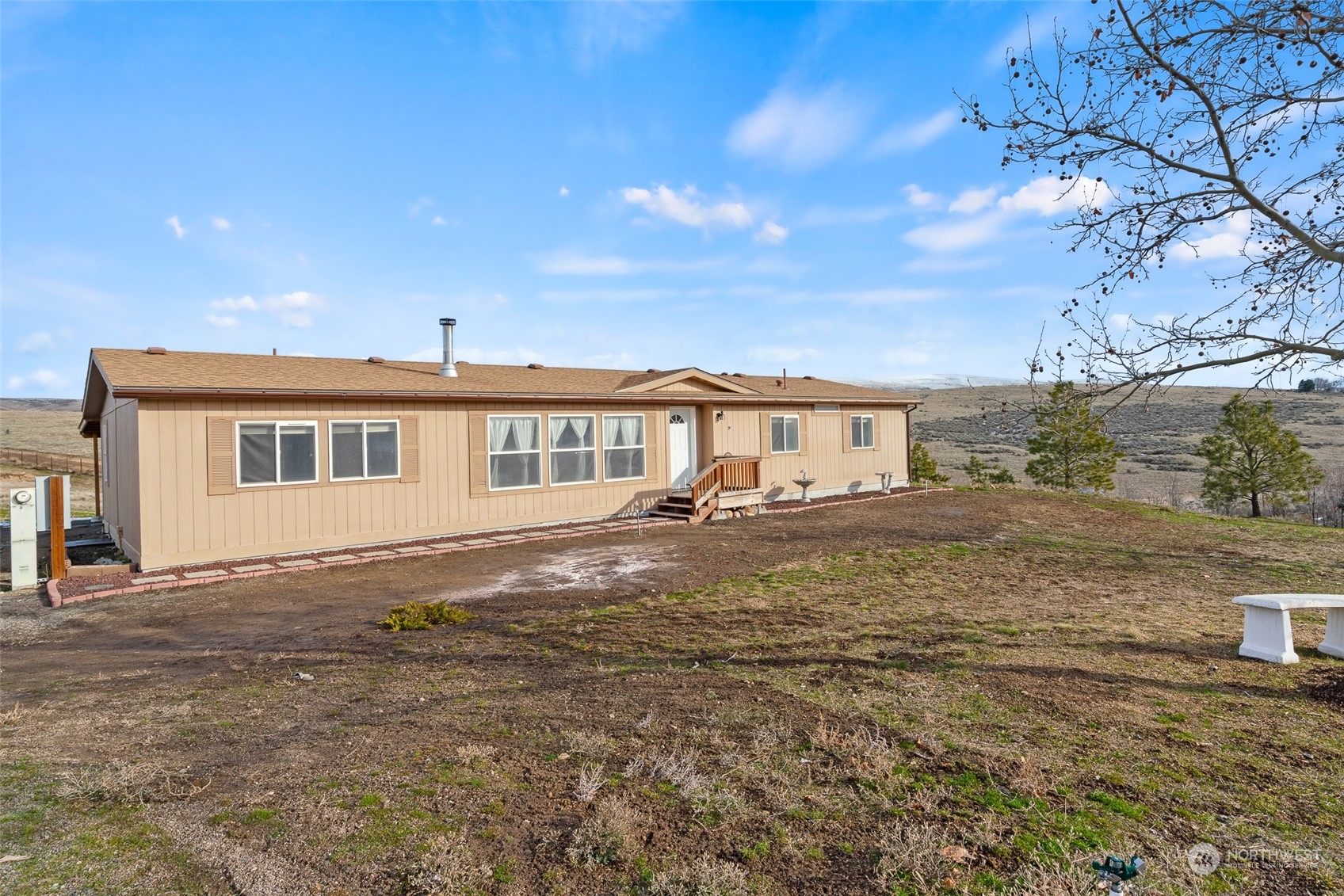1963 Freimuth Road Selah, WA 98942 - Photo 1 of 33 a front view of a house with a yard