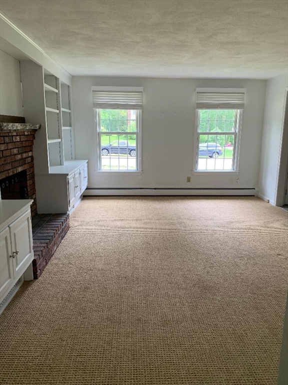 5 Countryside Way Andover, MA 01810 - Photo 13 of 41 an empty room with windows