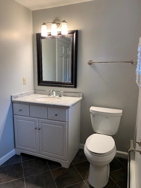 5 Countryside Way Andover, MA 01810 - Photo 19 of 41 a bathroom with a toilet sink and mirror