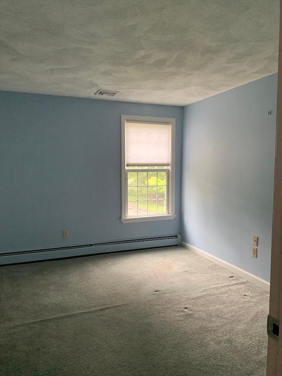 5 Countryside Way Andover, MA 01810 - Photo 23 of 41 a view of an empty room with a window