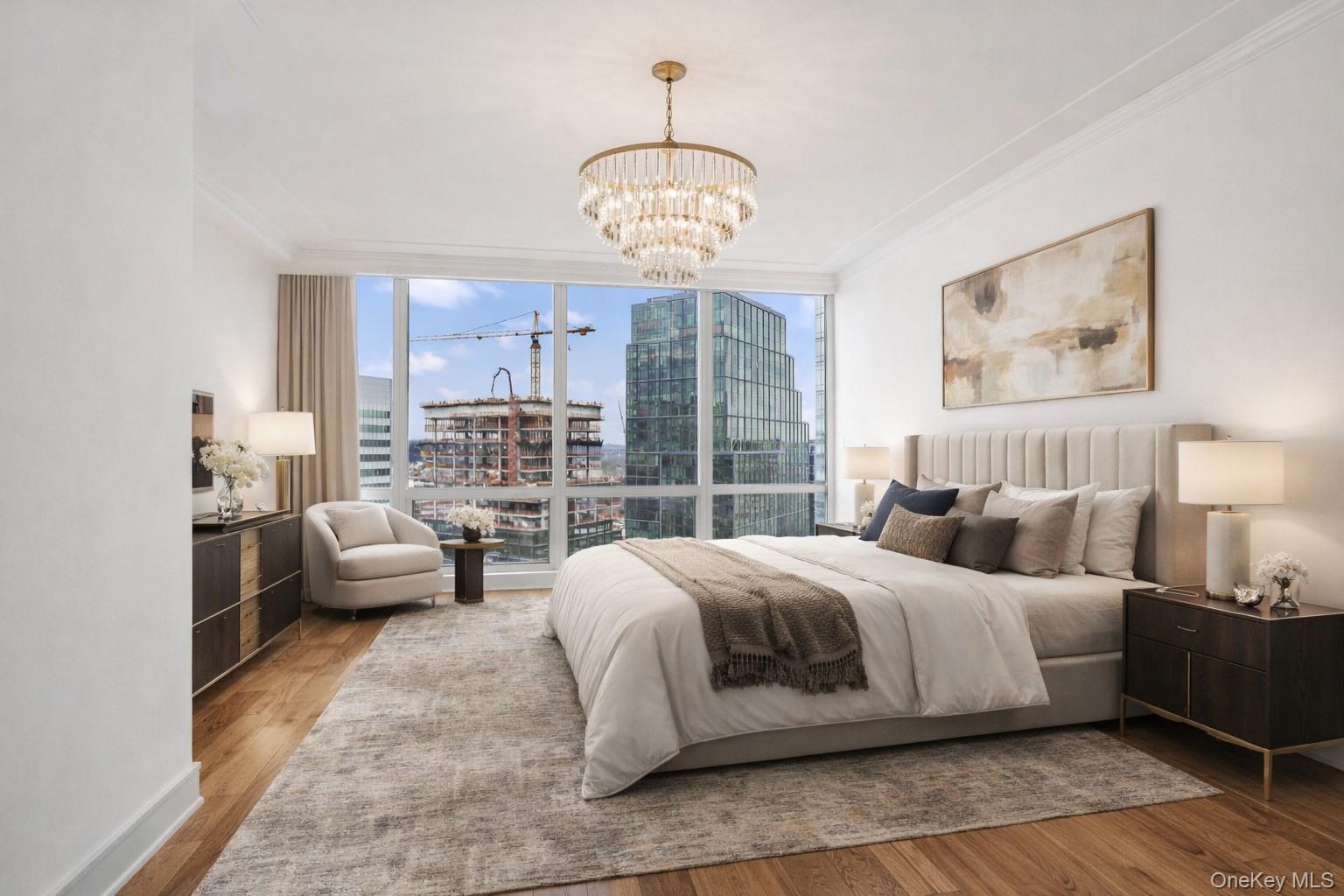 1 Renaissance Square, Unit 15E White Plains, NY 10601 - Photo 11 of 27 a bedroom with a bed and a chandelier