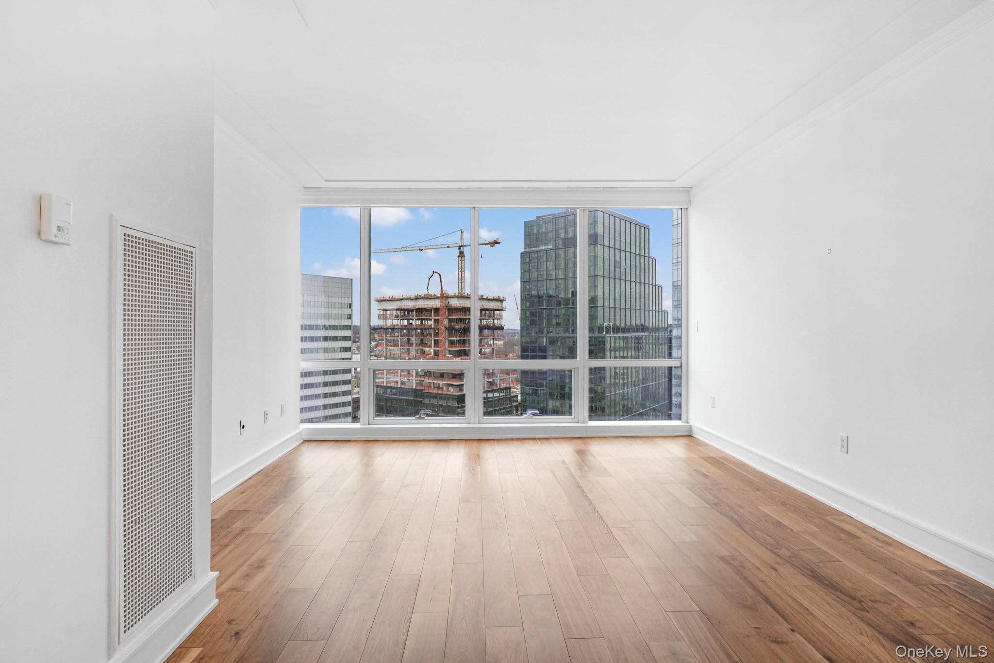 1 Renaissance Square, Unit 15E White Plains, NY 10601 - Photo 12 of 27 wooden floor in a room