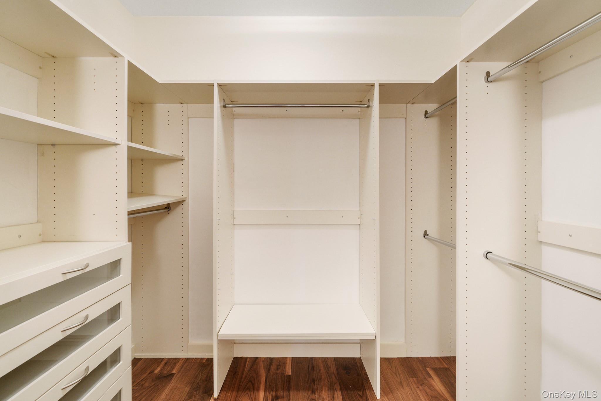 1 Renaissance Square, Unit 15E White Plains, NY 10601 - Photo 16 of 27 a view of walk in closet with empty racks
