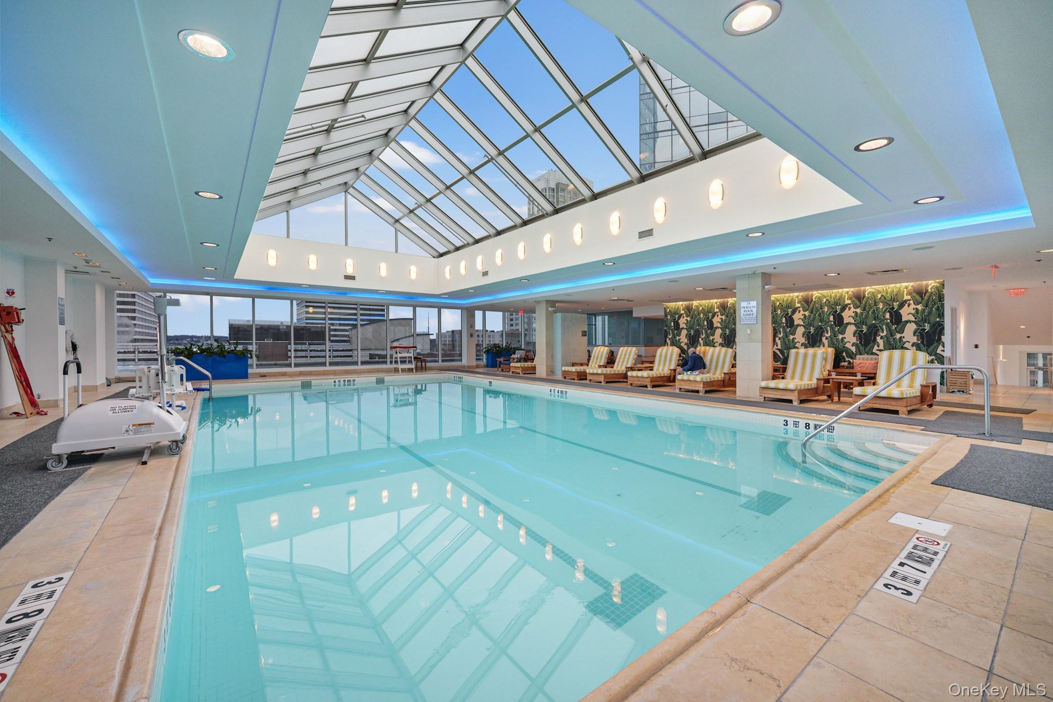 1 Renaissance Square, Unit 15E White Plains, NY 10601 - Photo 20 of 27 a view of a living room and kitchen