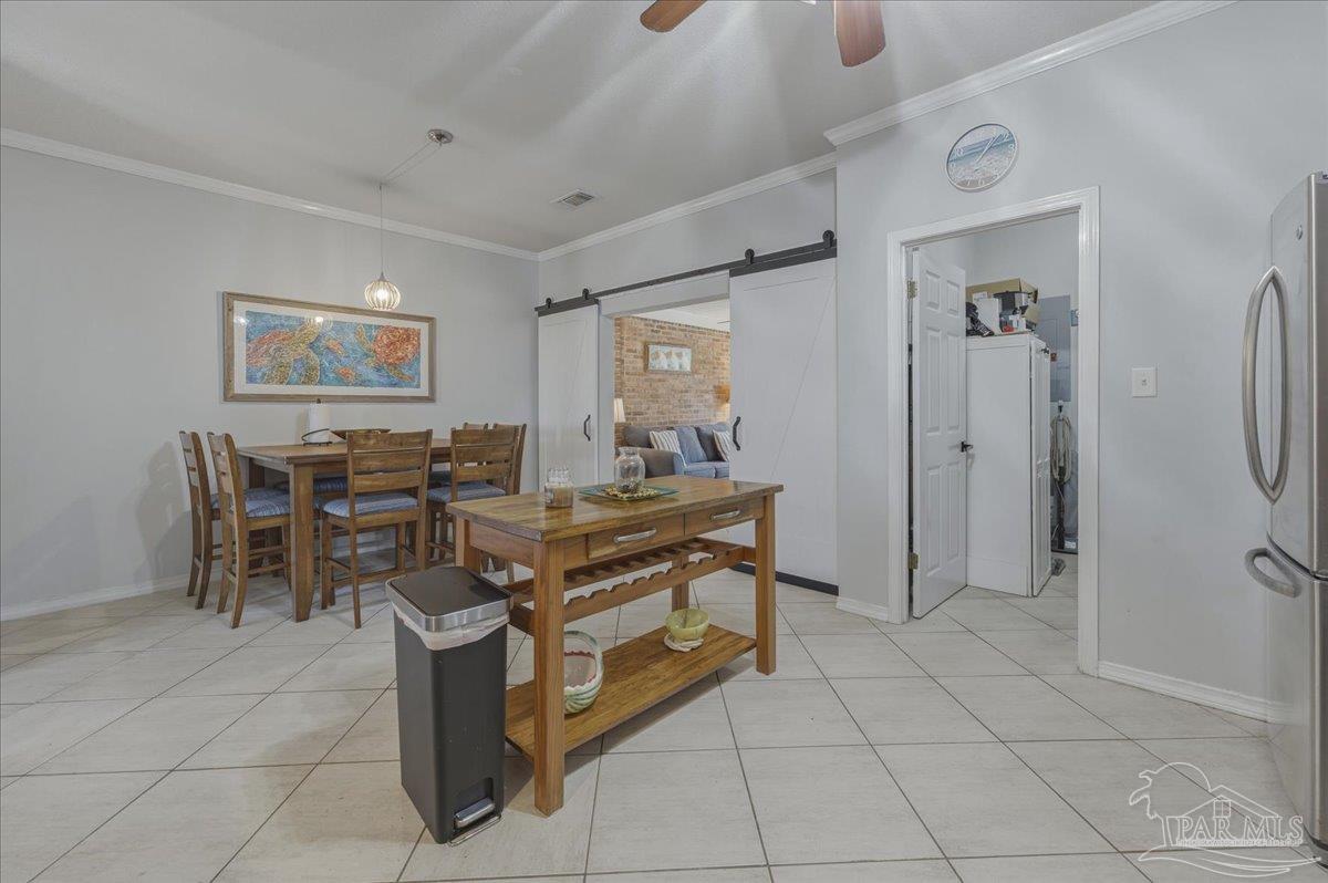 26063 Canal Road, Unit 3F Orange Beach, AL 36561 - Photo 28 of 72 a room with lots of furniture and shower