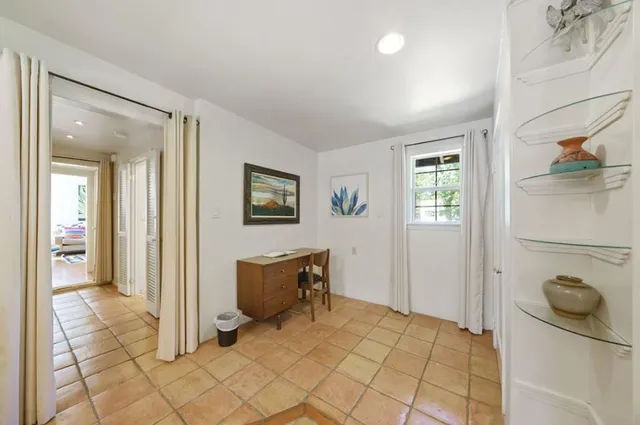 a view of livingroom with furniture and windows
