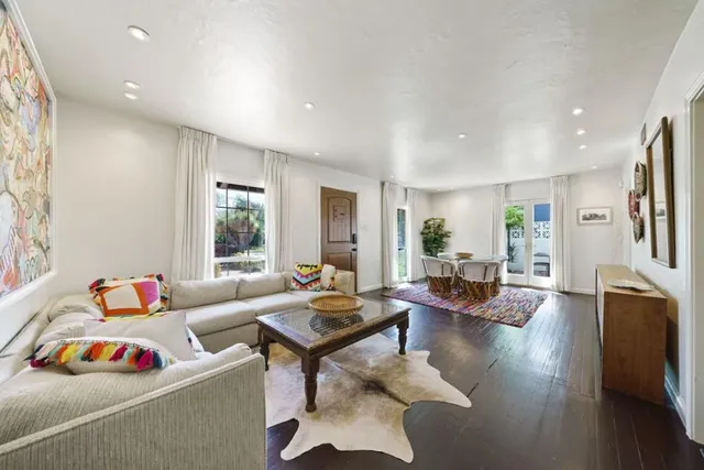 a living room with furniture and a couch