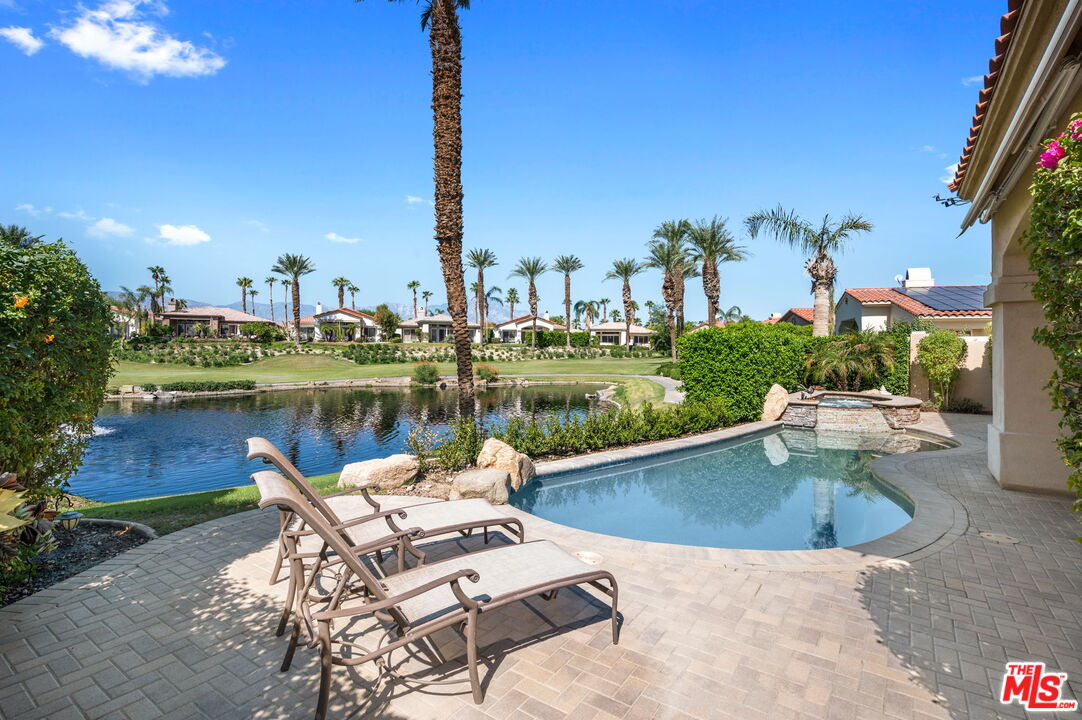 331 Tomahawk Drive Palm Desert, CA 92211 - Photo 34 of 40 a view of a lake with a patio