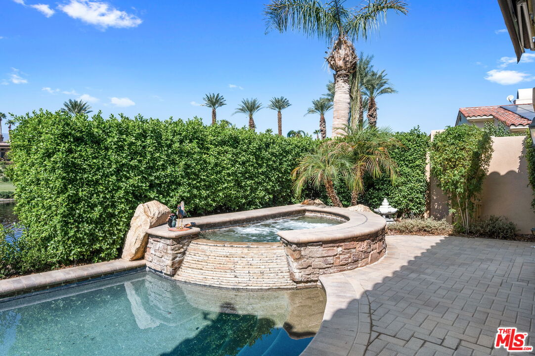 331 Tomahawk Drive Palm Desert, CA 92211 - Photo 36 of 40 a view of a backyard with plants and outdoor seating