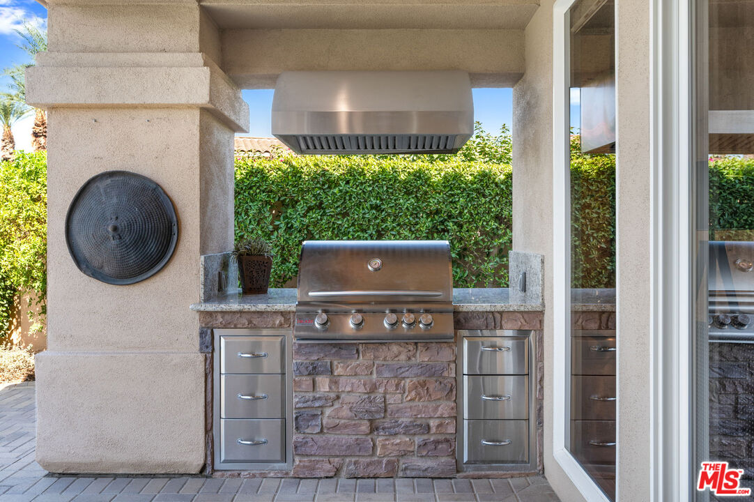 331 Tomahawk Drive Palm Desert, CA 92211 - Photo 37 of 40 a view of fireplace and window