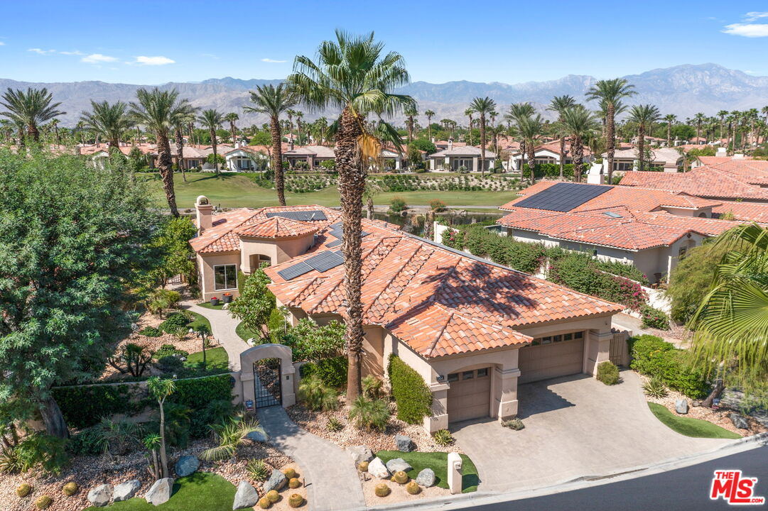 331 Tomahawk Drive Palm Desert, CA 92211 - Photo 38 of 40 a view of a house with yard and lake view