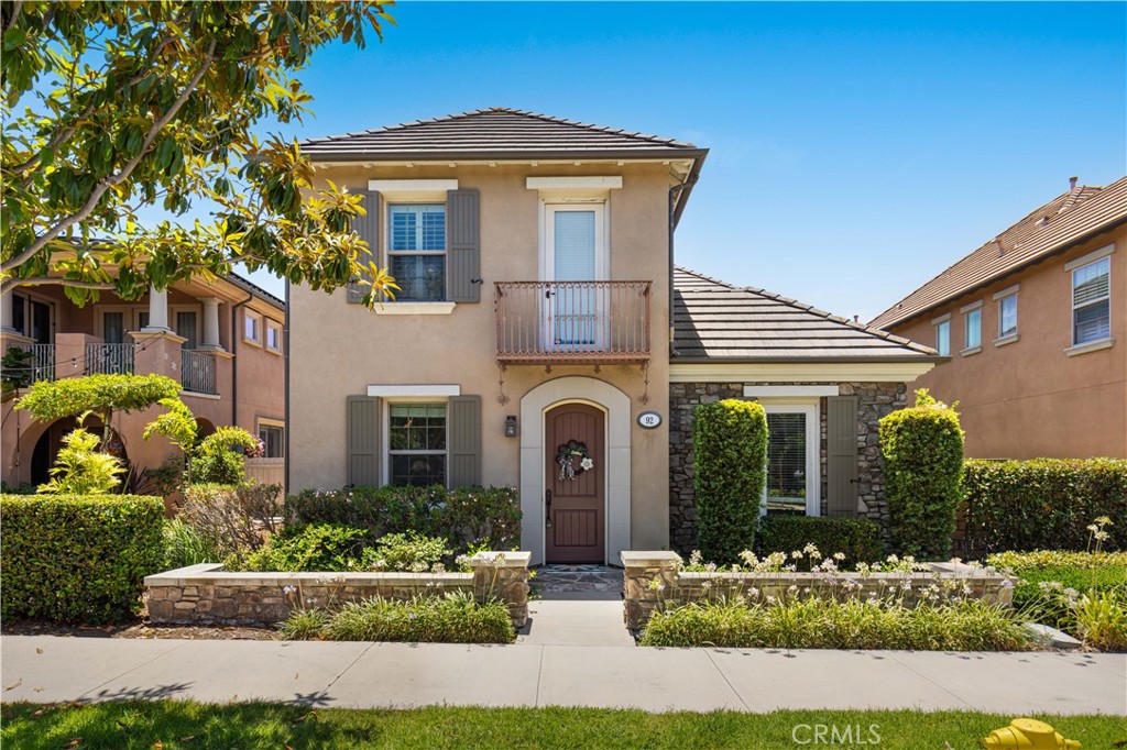 92 Rinaldi Irvine, CA 92620 - Photo 1 of 1 front view of a house with a yard