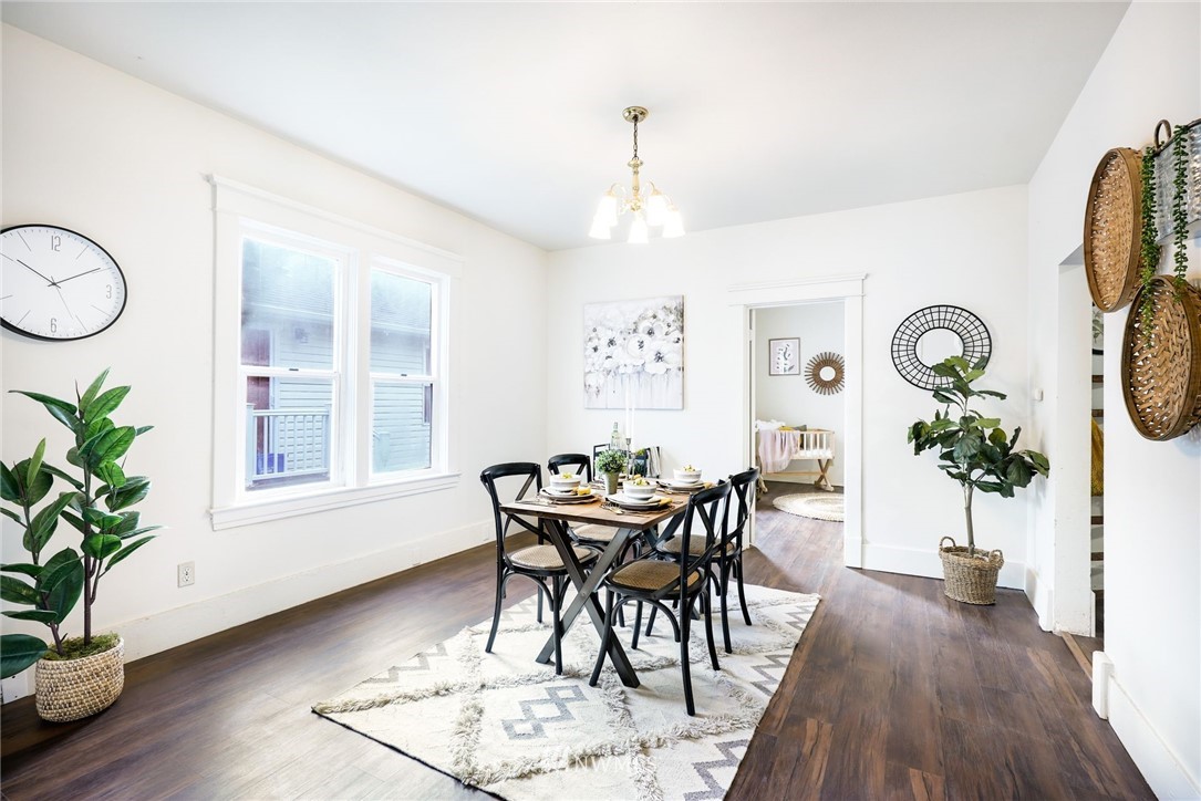 2320 Rockefeller Avenue Everett, WA 98201 - Photo 4 of 28 a view of a dining room with furniture and wooden floor