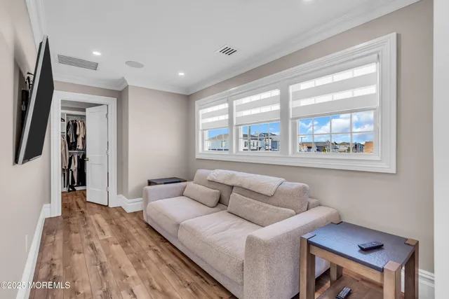 a kitchen with a refrigerator and a stove top oven