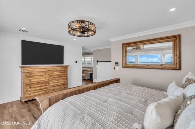 a large bathroom with a tub sink shower and mirror