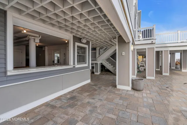 a view of roof deck with seating space