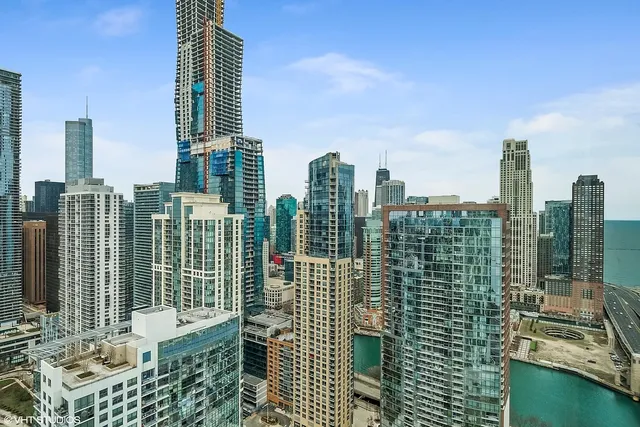 a view of city with tall buildings