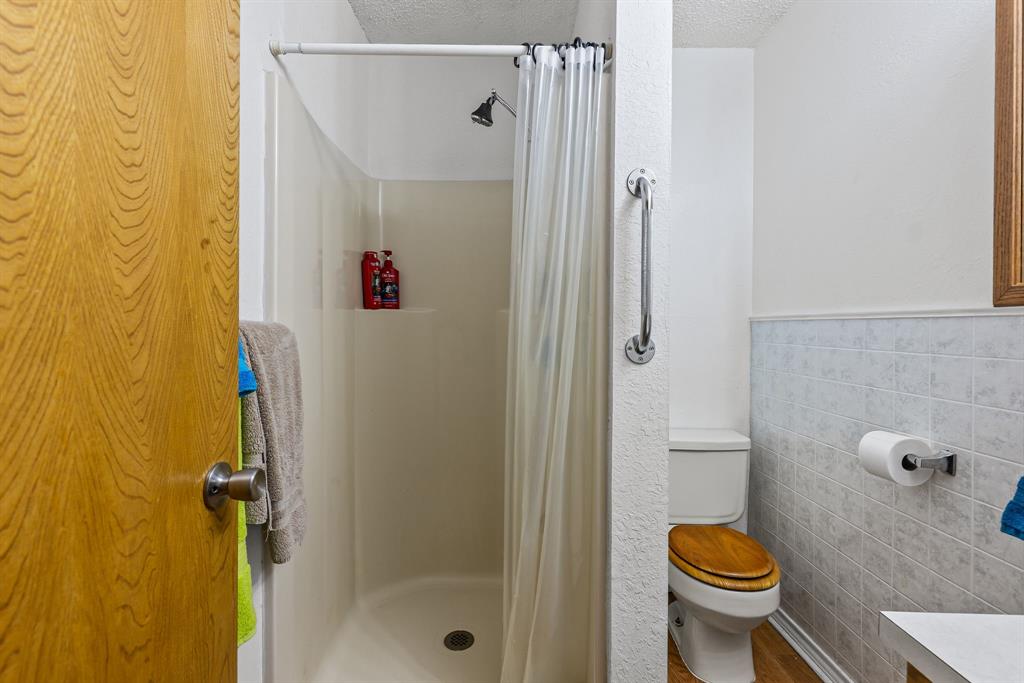 206 North Main Street Bailey, TX 75452 - Photo 16 of 30 a bathroom with a sink and a toilet