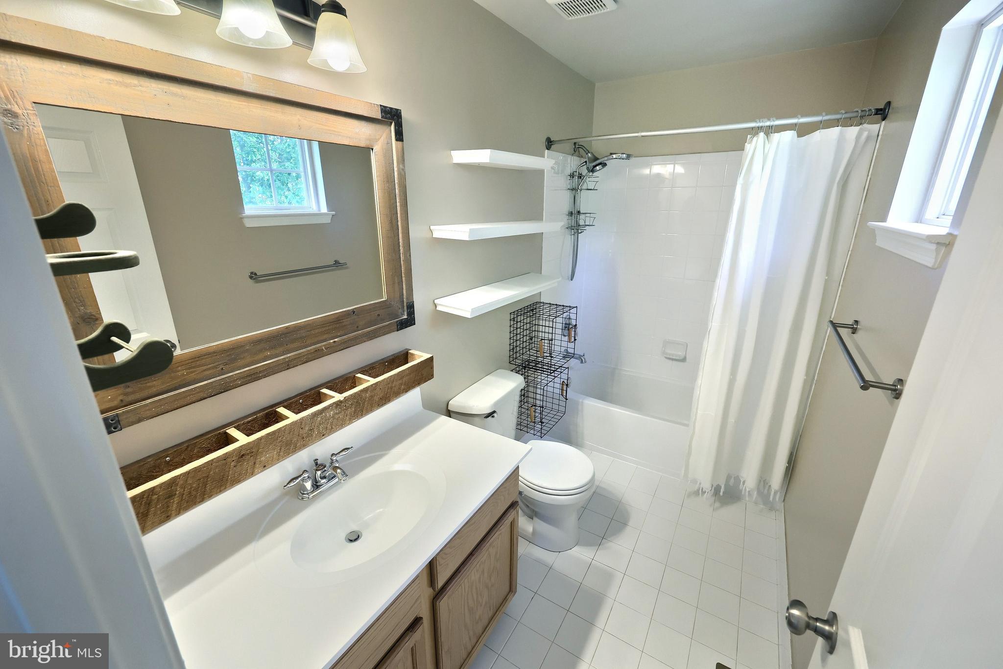 425 Lakeview Drive Spring Grove, PA 17362 - Photo 39 of 51 a bathroom with a sink toilet and shower