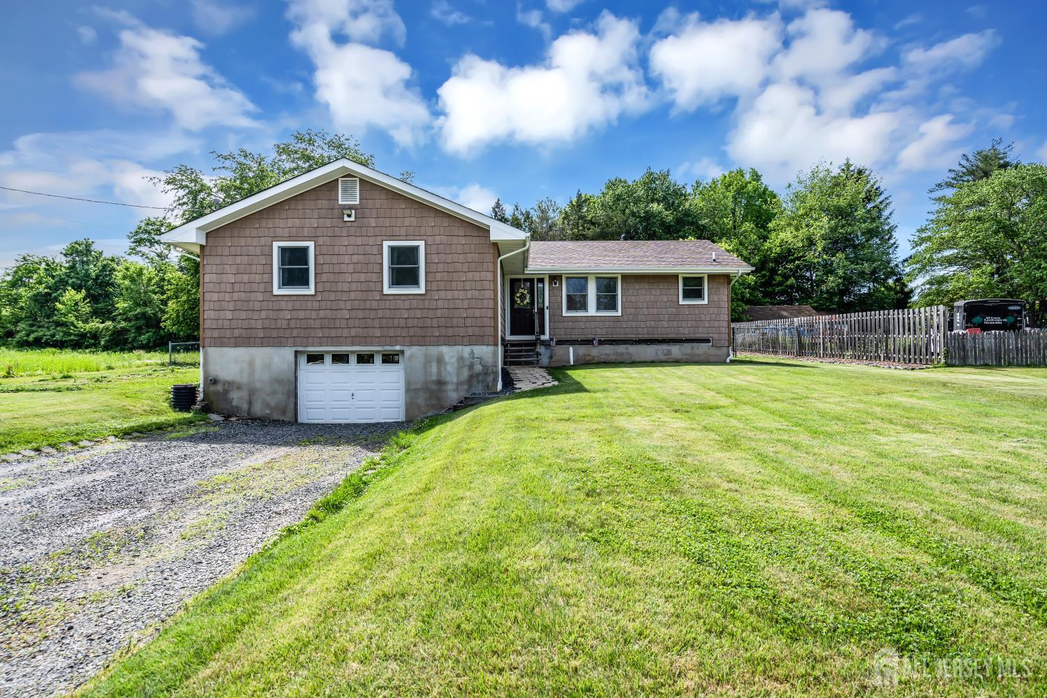 99 Schulmeister Road Old Bridge, NJ 08857 - Photo 2 of 49 a view of a house with a yard