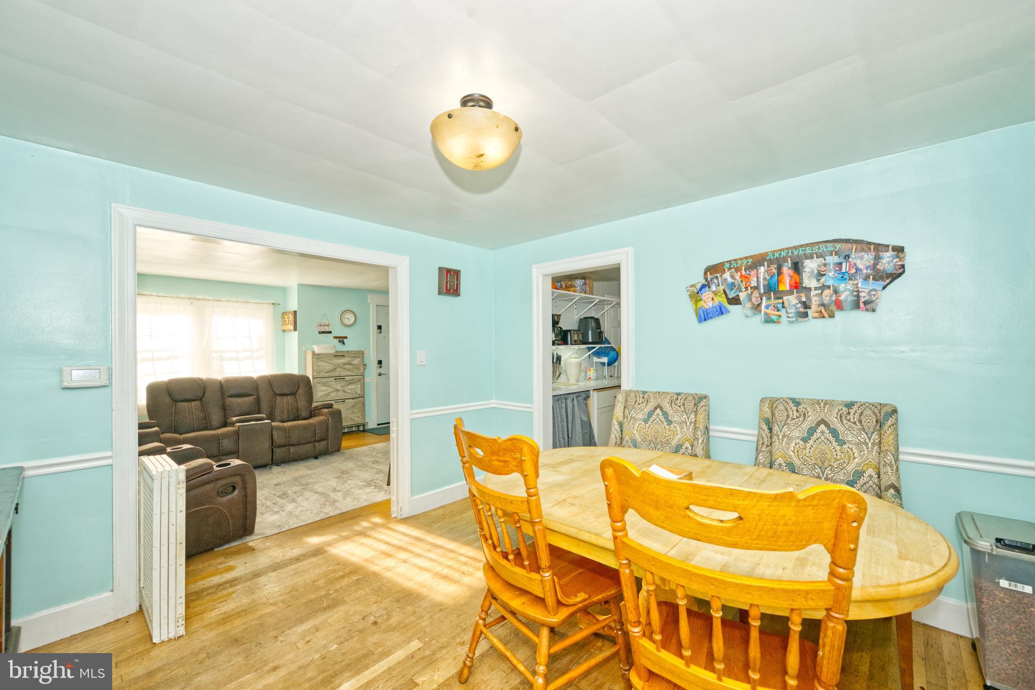Dining Room with Hardwood Flooring