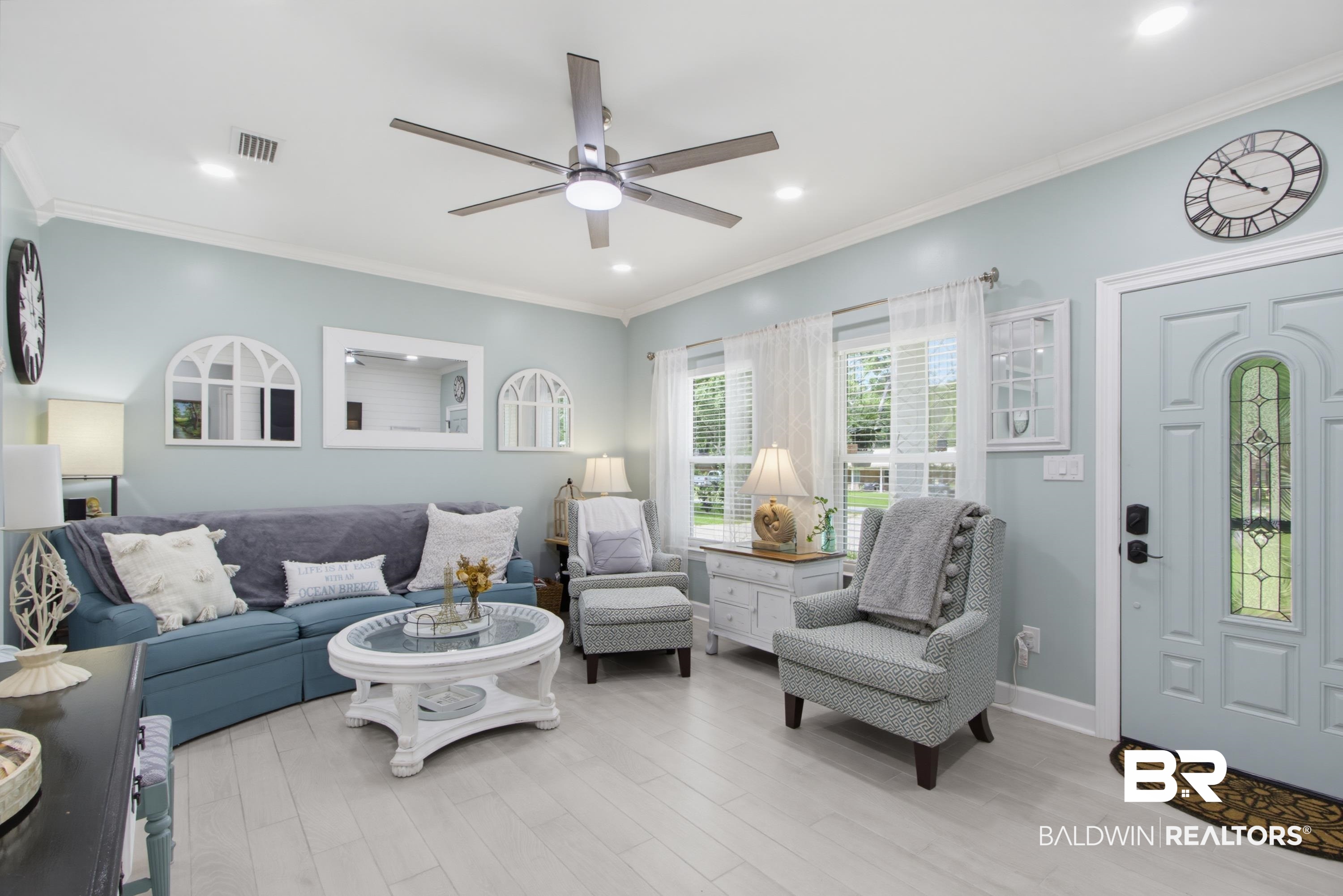 7472 Coopers Landing Road Foley, AL 36535 - Photo 2 of 40 Shiplap wall and light flooring complements the sea salt walls in this living space
