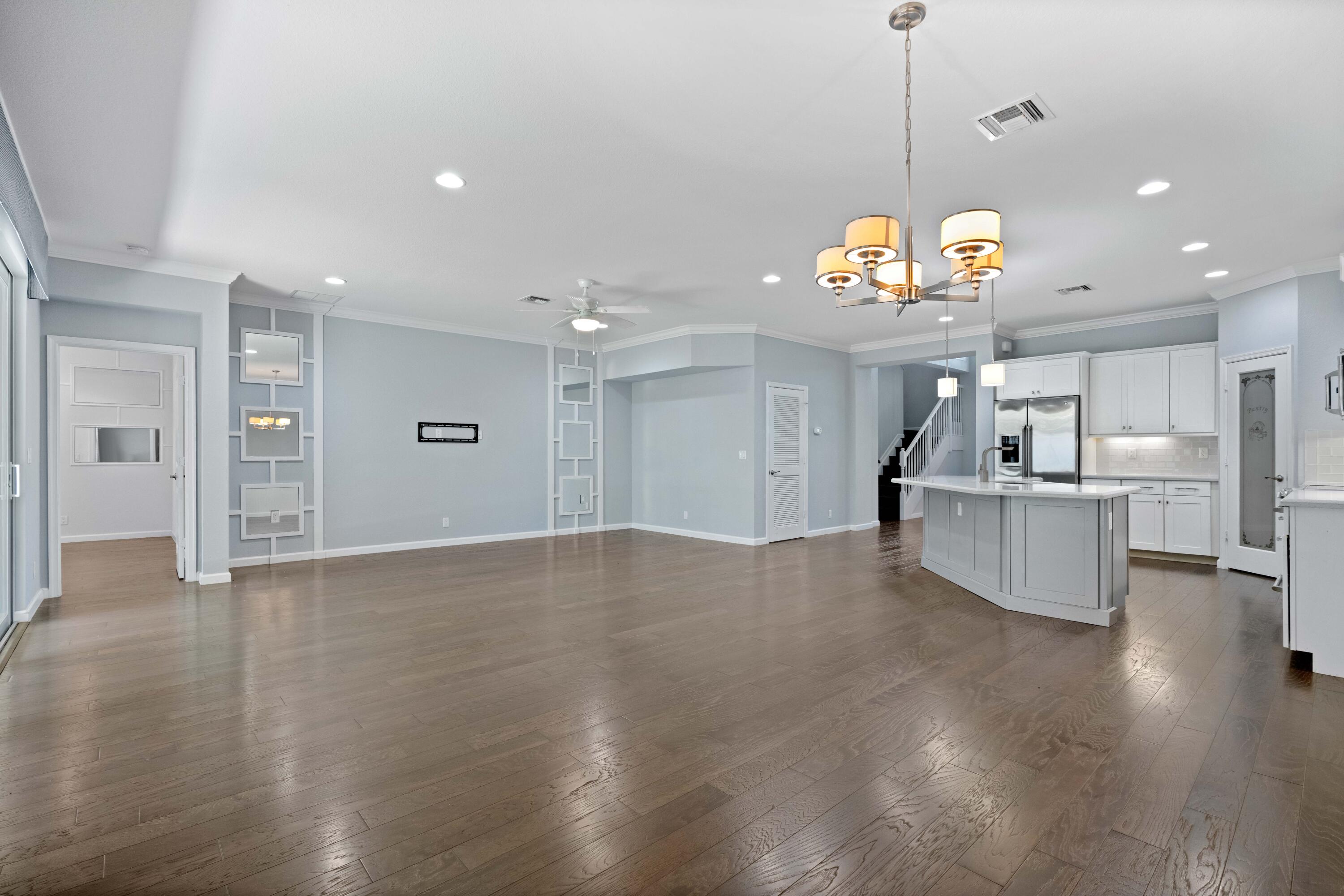 7018 Limestone Cay Road Jupiter, FL 33458 - Photo 20 of 23 a view of a kitchen with a sink and breakfast area