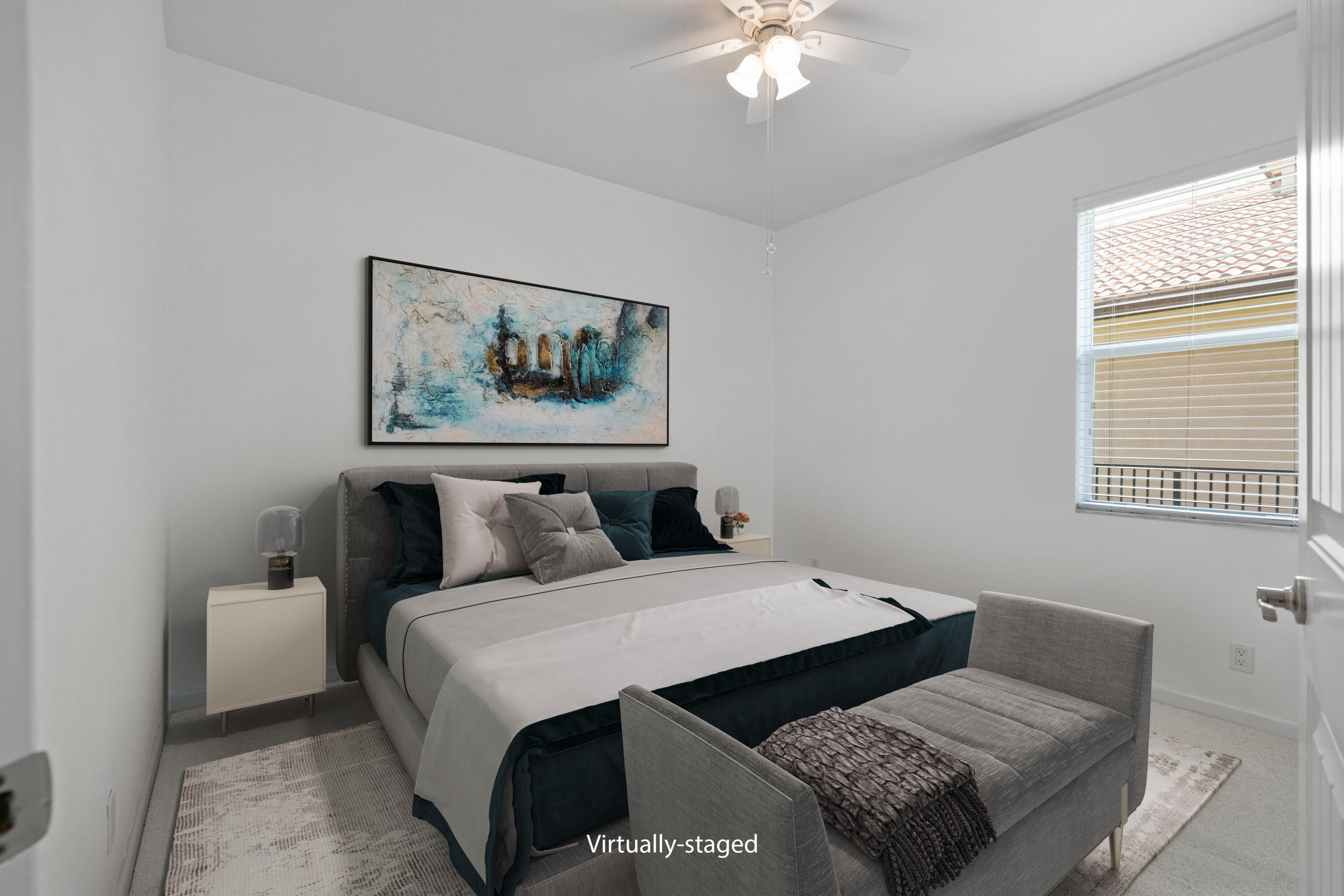 7018 Limestone Cay Road Jupiter, FL 33458 - Photo 8 of 23 a bed room with a bed and a painting on the wall