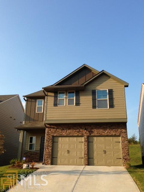 4940 Longview Run, Unit 7 Decatur, GA 30035 - Photo 1 of 1 a front view of a house with garage