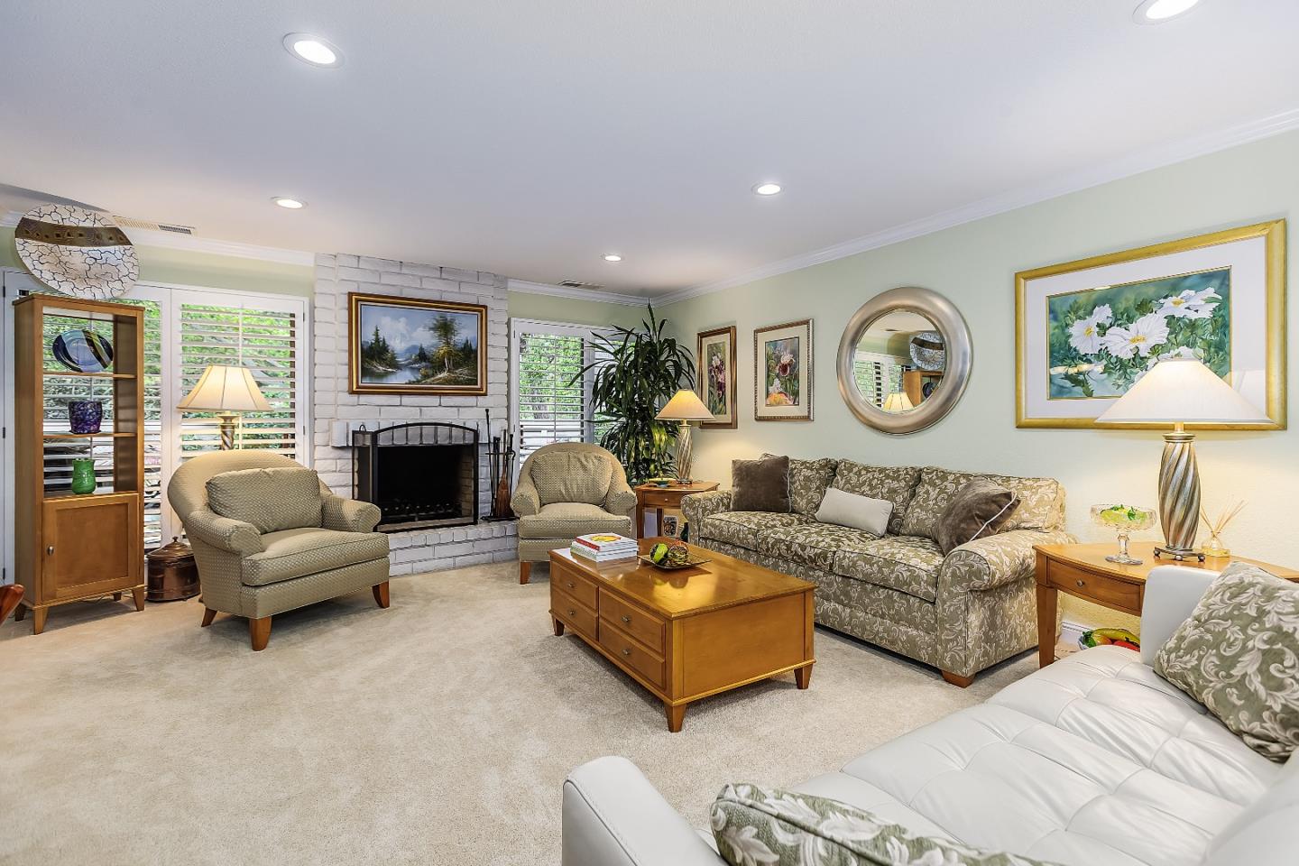 26 Deep Well Lane Los Altos, CA 94022 - Photo 14 of 39 a living room with couches and a fireplace