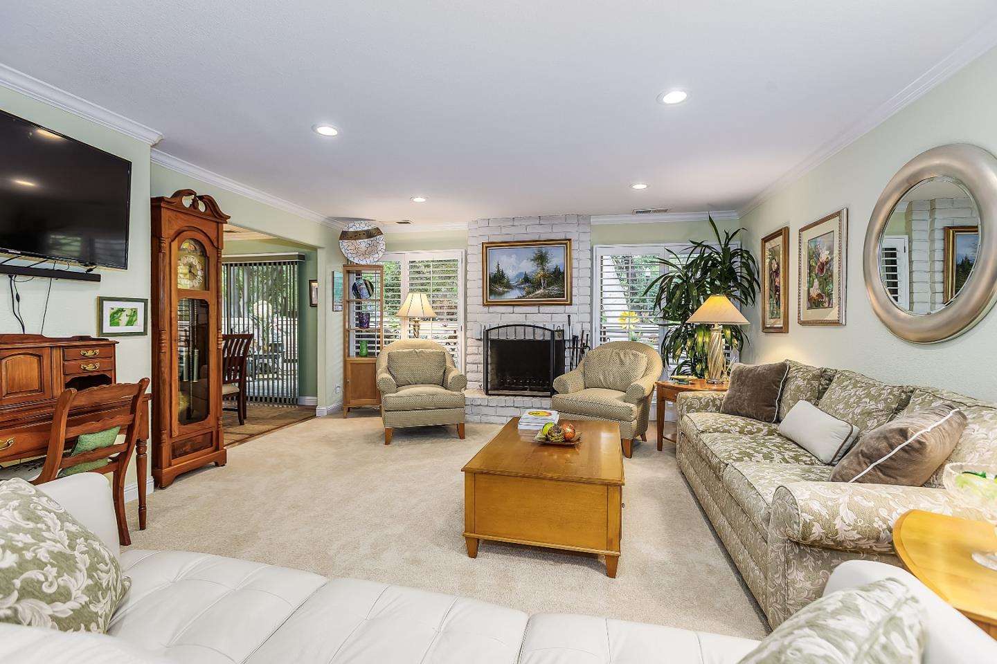 26 Deep Well Lane Los Altos, CA 94022 - Photo 15 of 39 a living room with furniture and a flat screen tv