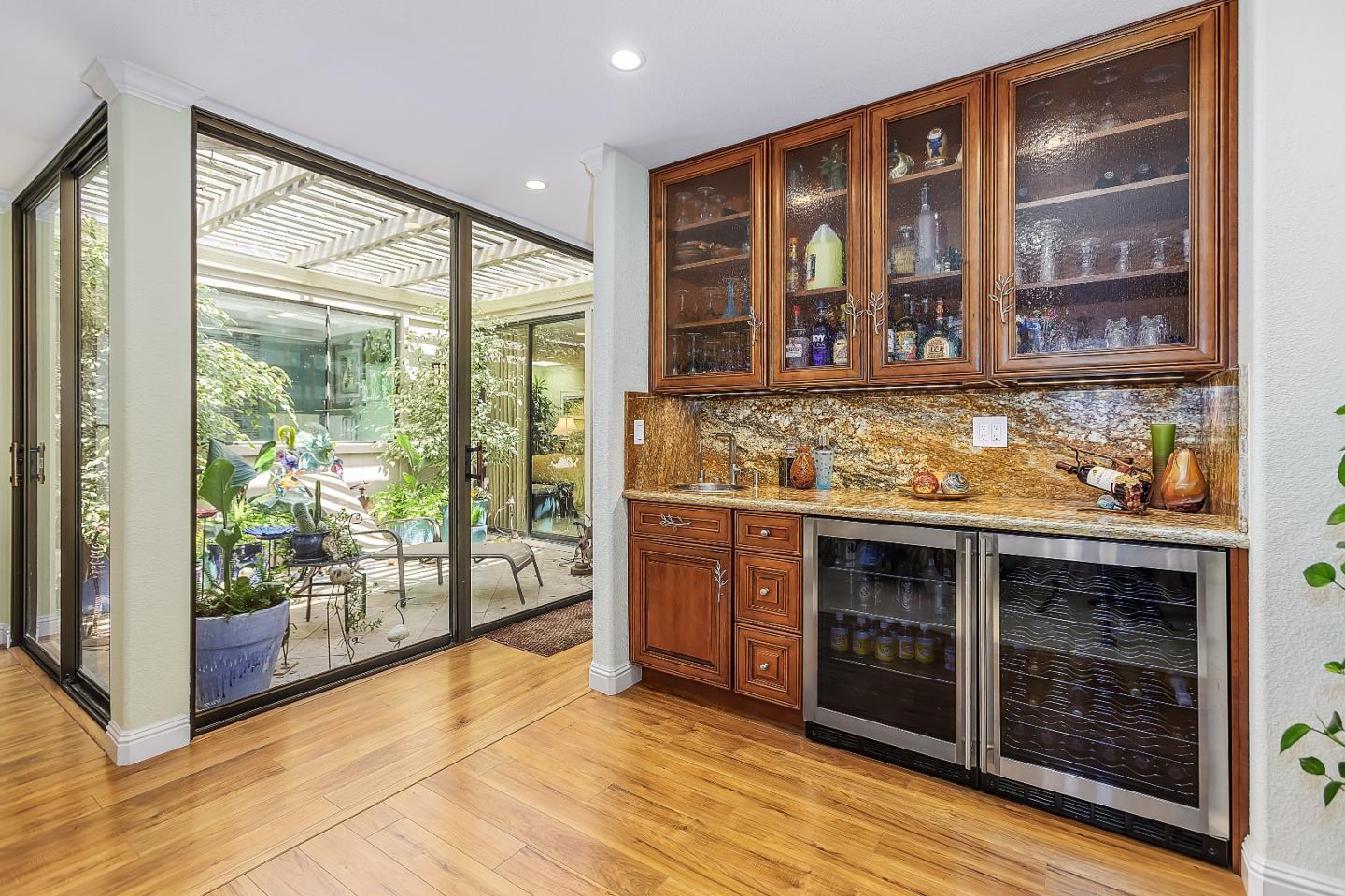 26 Deep Well Lane Los Altos, CA 94022 - Photo 16 of 39 a view of open kitchen with granite countertop a stove top oven