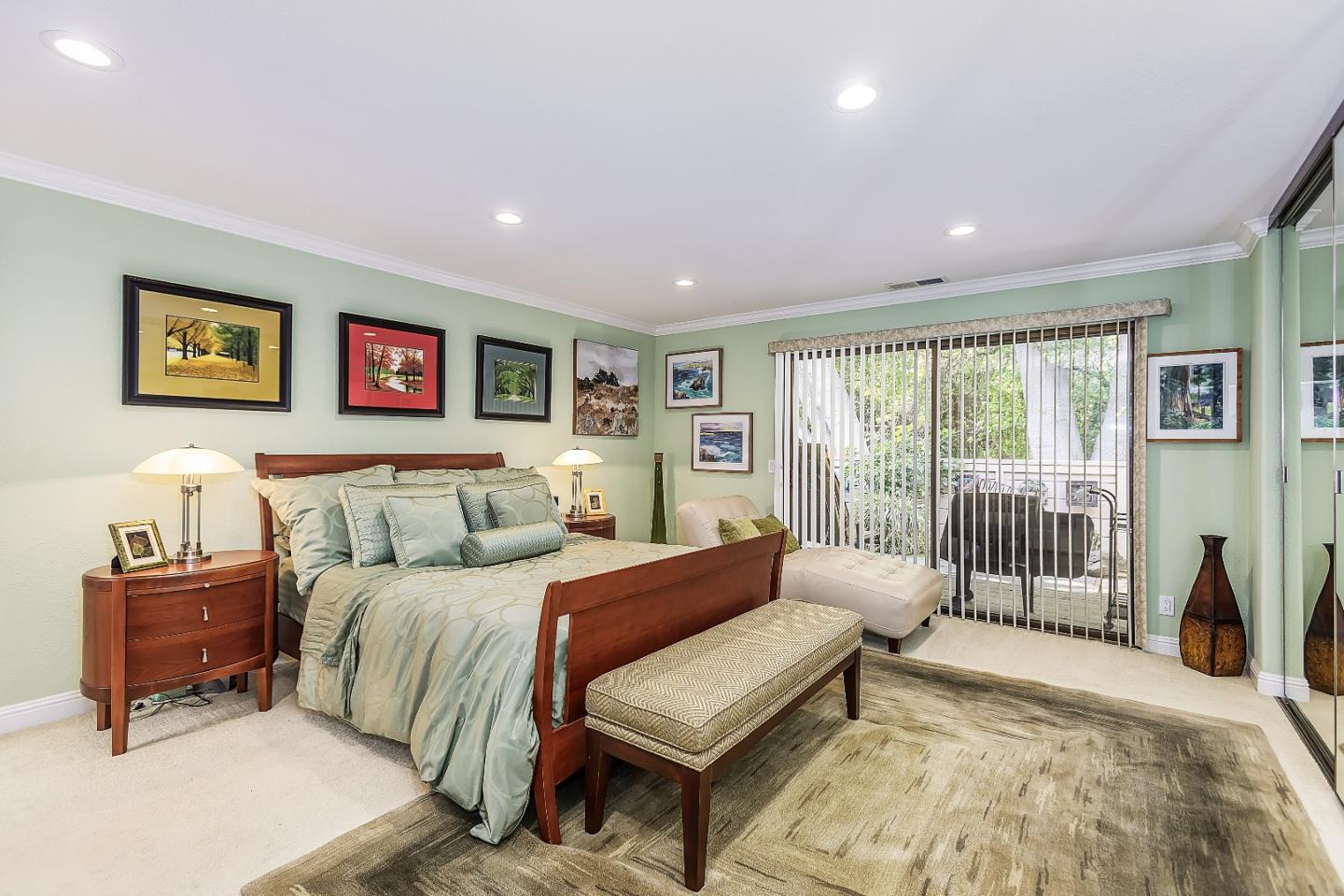 26 Deep Well Lane Los Altos, CA 94022 - Photo 18 of 39 a bedroom with a bed and wooden floor