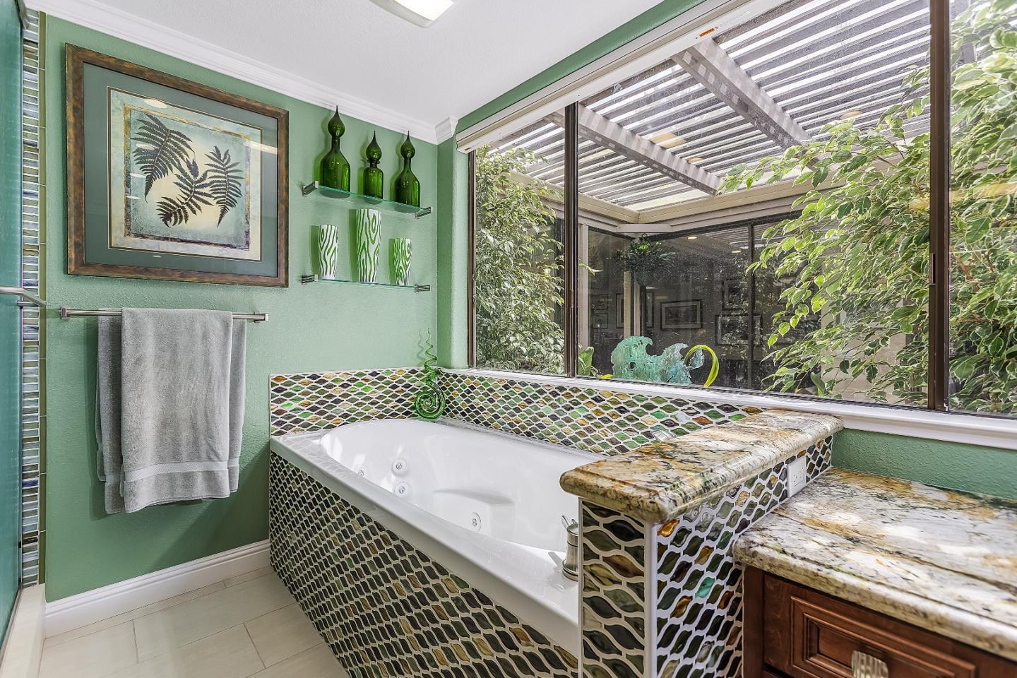 26 Deep Well Lane Los Altos, CA 94022 - Photo 22 of 39 a bath tub sitting next to a window