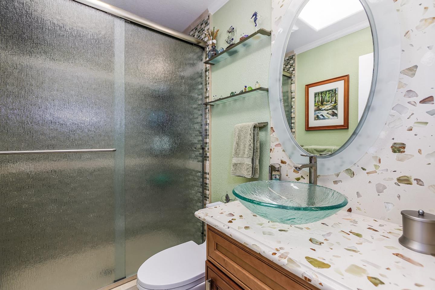 26 Deep Well Lane Los Altos, CA 94022 - Photo 27 of 39 a bathroom with a sink toilet and shower
