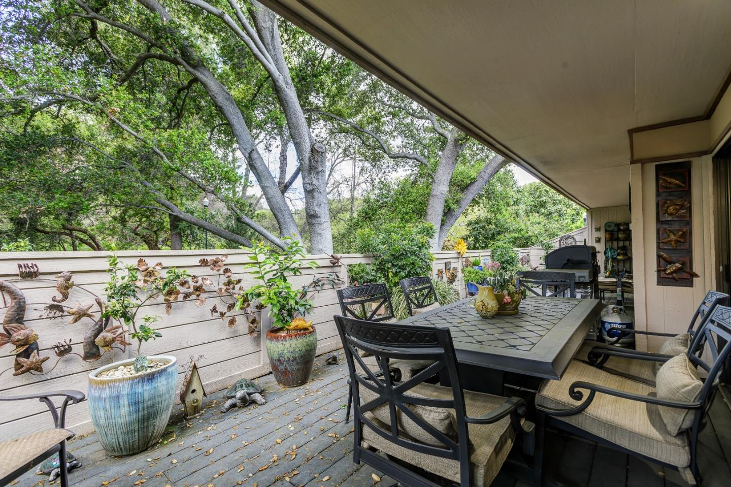 26 Deep Well Lane Los Altos, CA 94022 - Photo 30 of 39 a view of a patio with table and chairs and potted plants