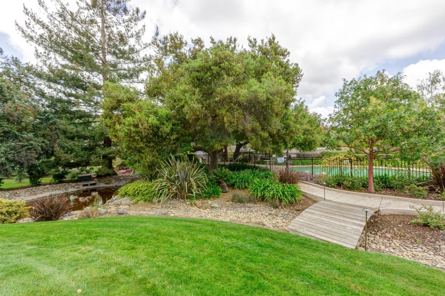 26 Deep Well Lane Los Altos, CA 94022 - Photo 35 of 39 a view of green field with wooden fence