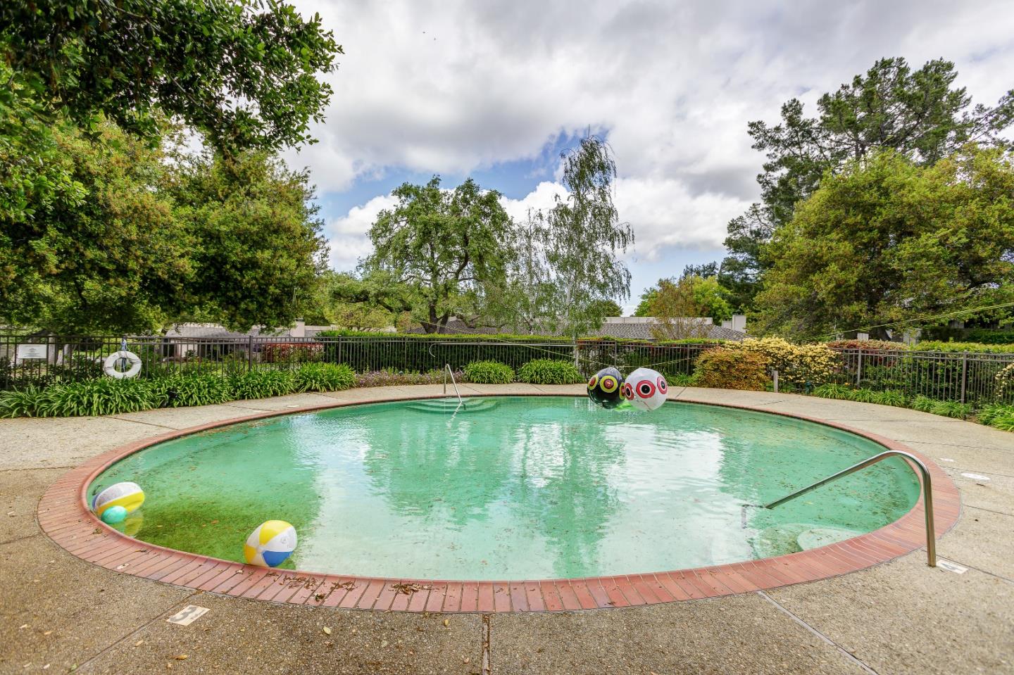 26 Deep Well Lane Los Altos, CA 94022 - Photo 36 of 39 a view of a swimming pool with a yard
