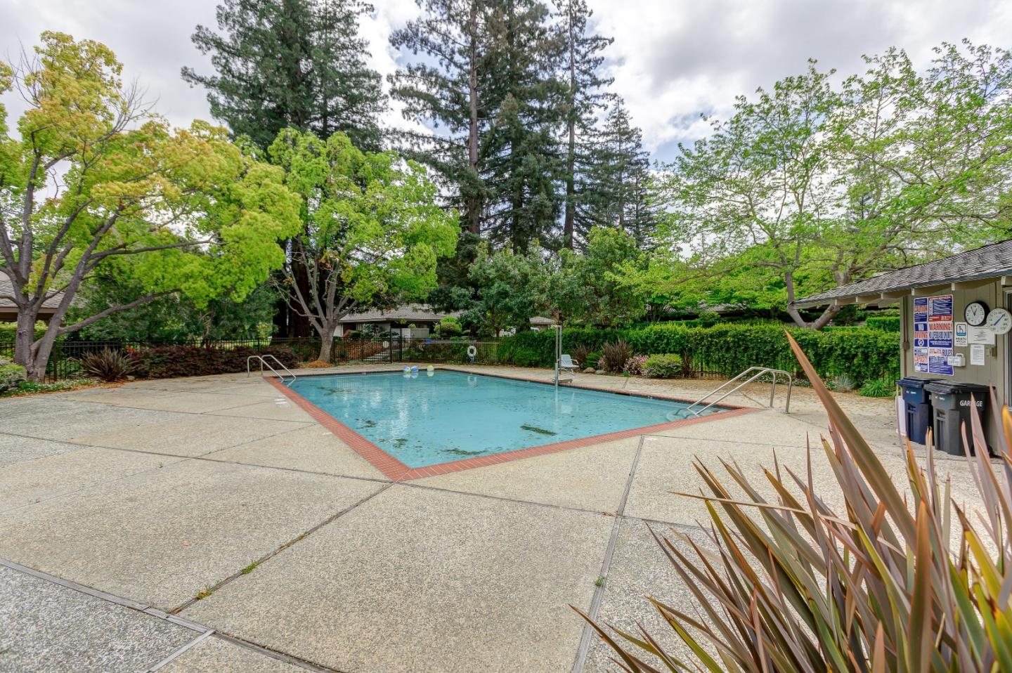 26 Deep Well Lane Los Altos, CA 94022 - Photo 38 of 39 a view of a swimming pool with a patio and a yard