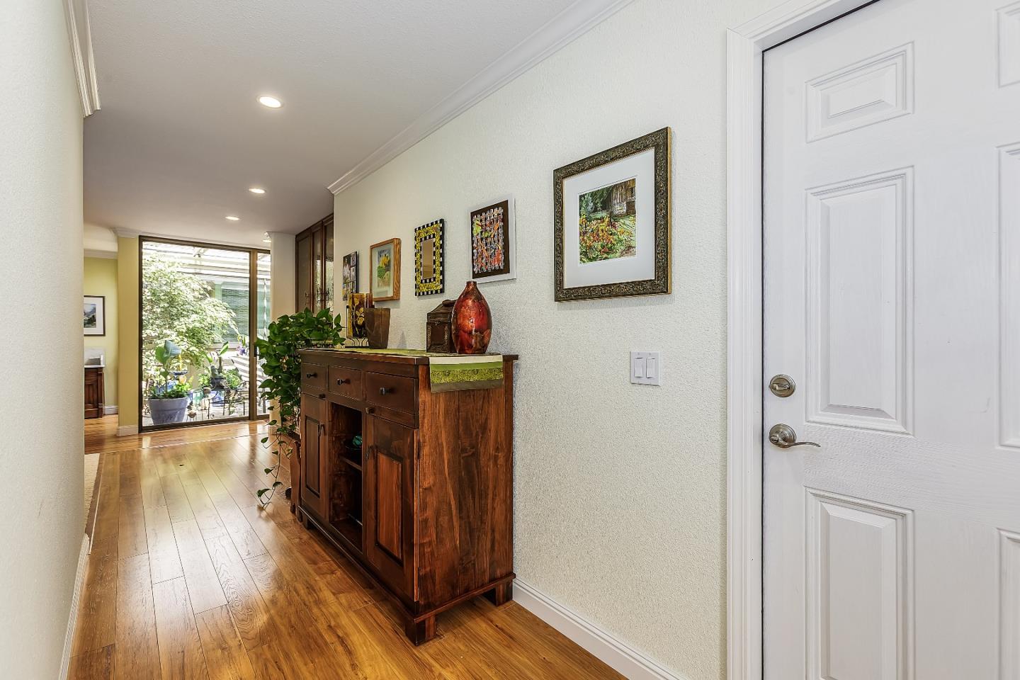 26 Deep Well Lane Los Altos, CA 94022 - Photo 5 of 39 a living room with furniture and a wooden floor