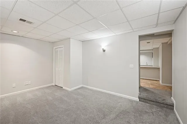 a view of house with swimming pool outdoor seating area and barbeque oven