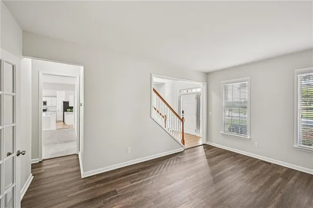 a room with a table and chairs