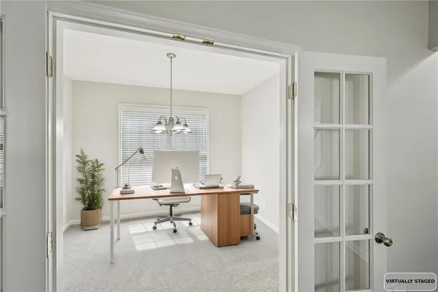 a kitchen with granite countertop a sink and a window