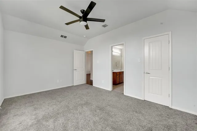 a view of a livingroom with a ceiling fan