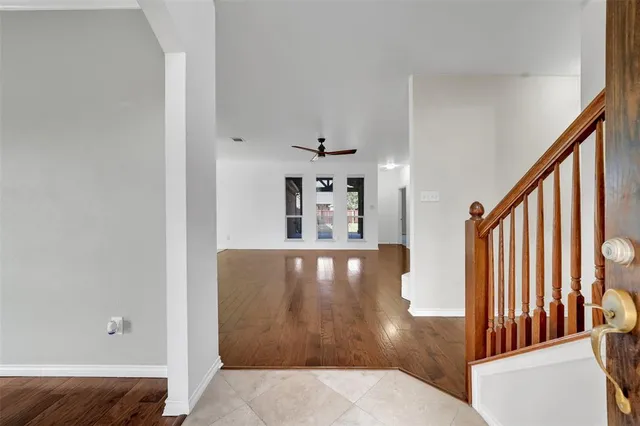 a view of gallery with wooden floor