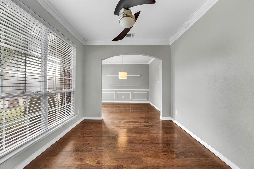3305 Silver Springs Way Rowlett, TX 75089 - Photo 6 of 40 a view of empty room with wooden floor and fan